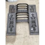 A PAIR OF DECORATIVE CAST IRON FIRE PLACES