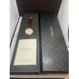 A NEW AND BOXED POVEY WRISTWATCH WITH PRESENTATION BOX IN WORKING ORDER