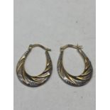 A PAIR OF 9 CARAT GOLD HOOP EARRINGS GROSS WEIGHT 0.9g