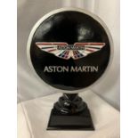 A LARGE ASTON MARTIN SIGN ON A WOODEN PLINTH H: APPROXIMATELY 52CM