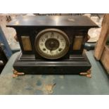 A VICTORIAN ORNATE MARBLE AND SLATE MANTLE CLOCK WITH LION HEAD DECORATION TO SIDES (KEY)