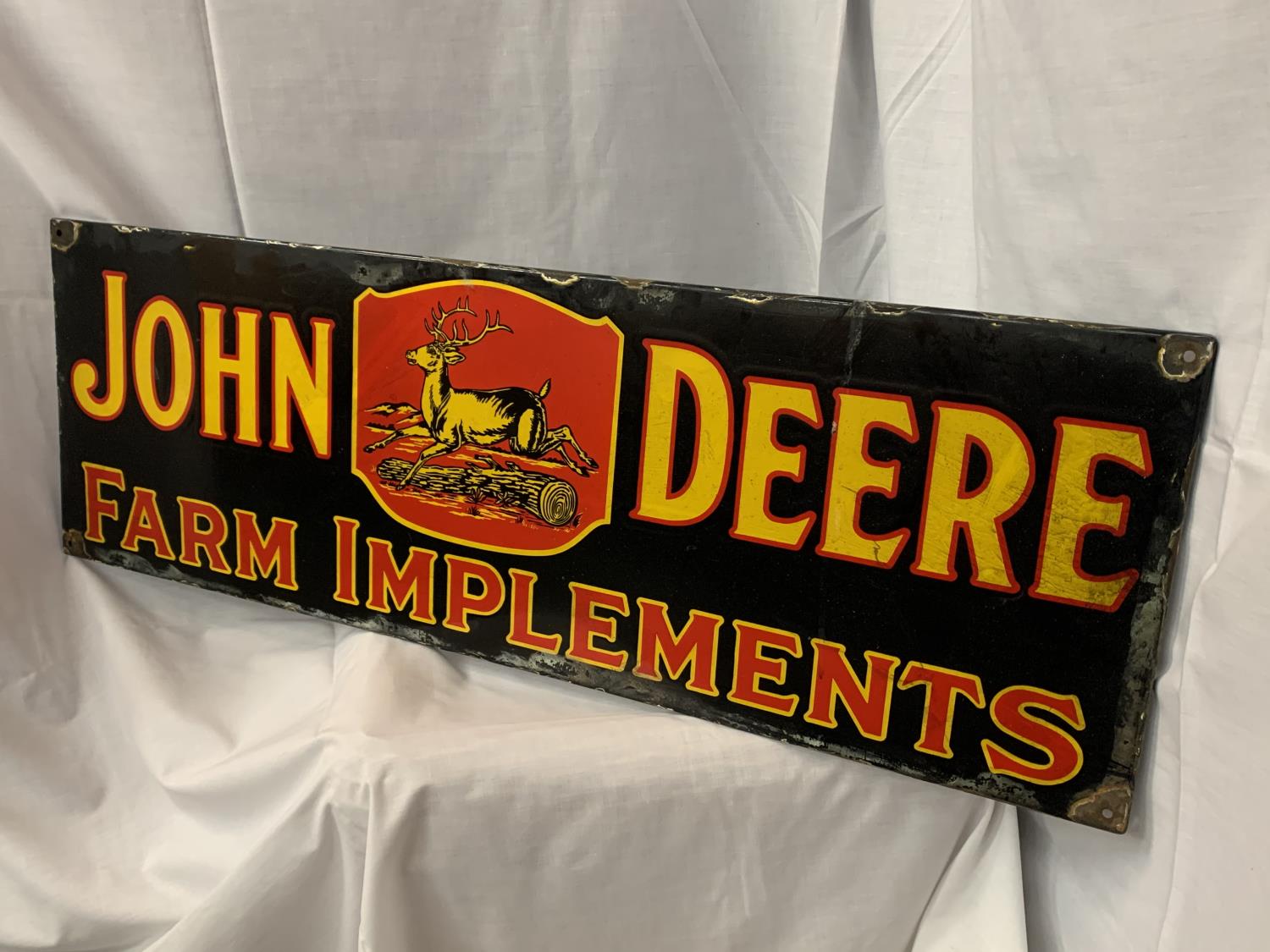 AN ENAMEL JOHN DEERE TRACTOR SIGN