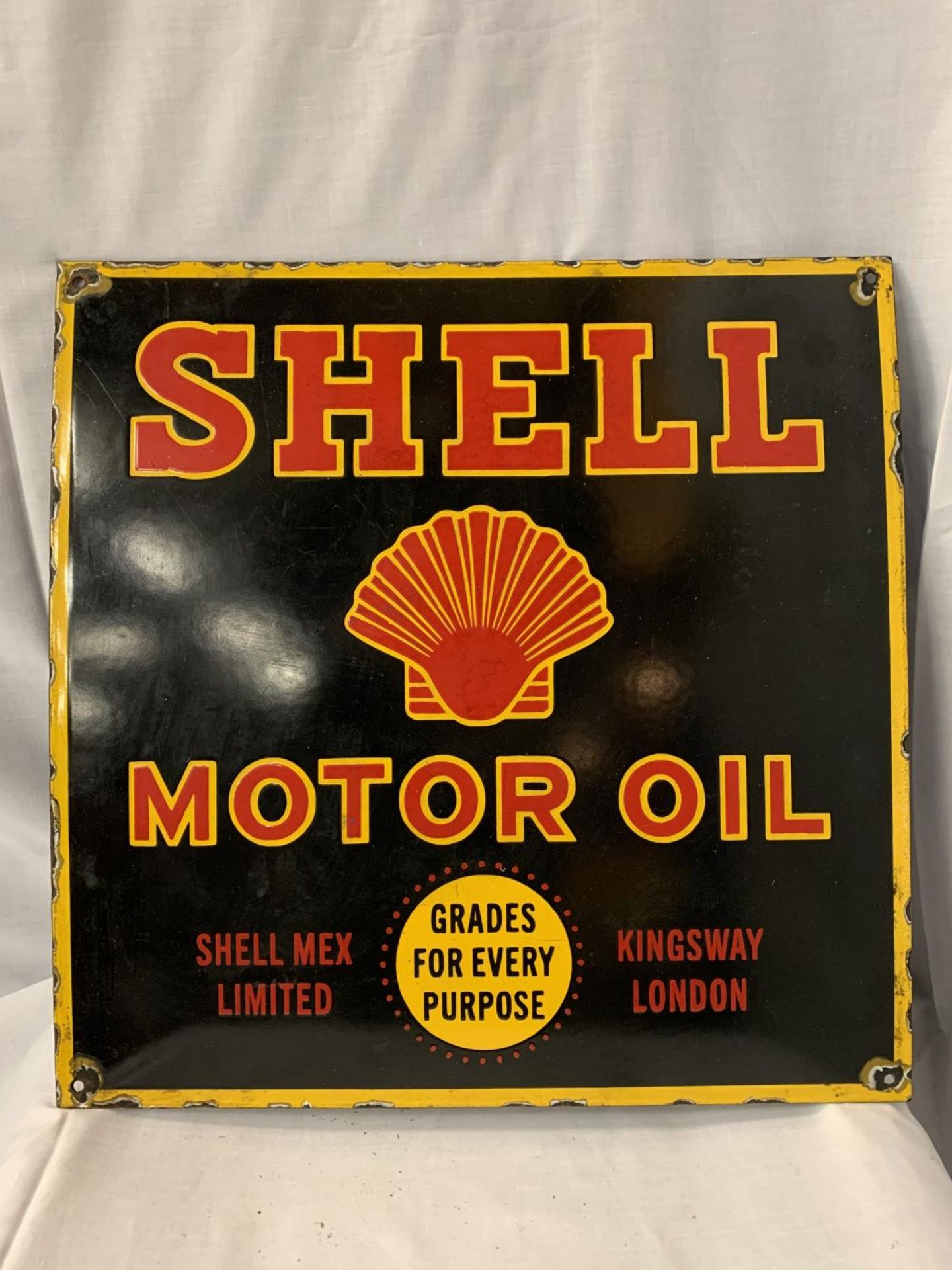 AN ENAMEL SHELL MOTOR OIL SIGN