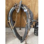 A VINTAGE HEAVY HORSE HEAD COLLAR