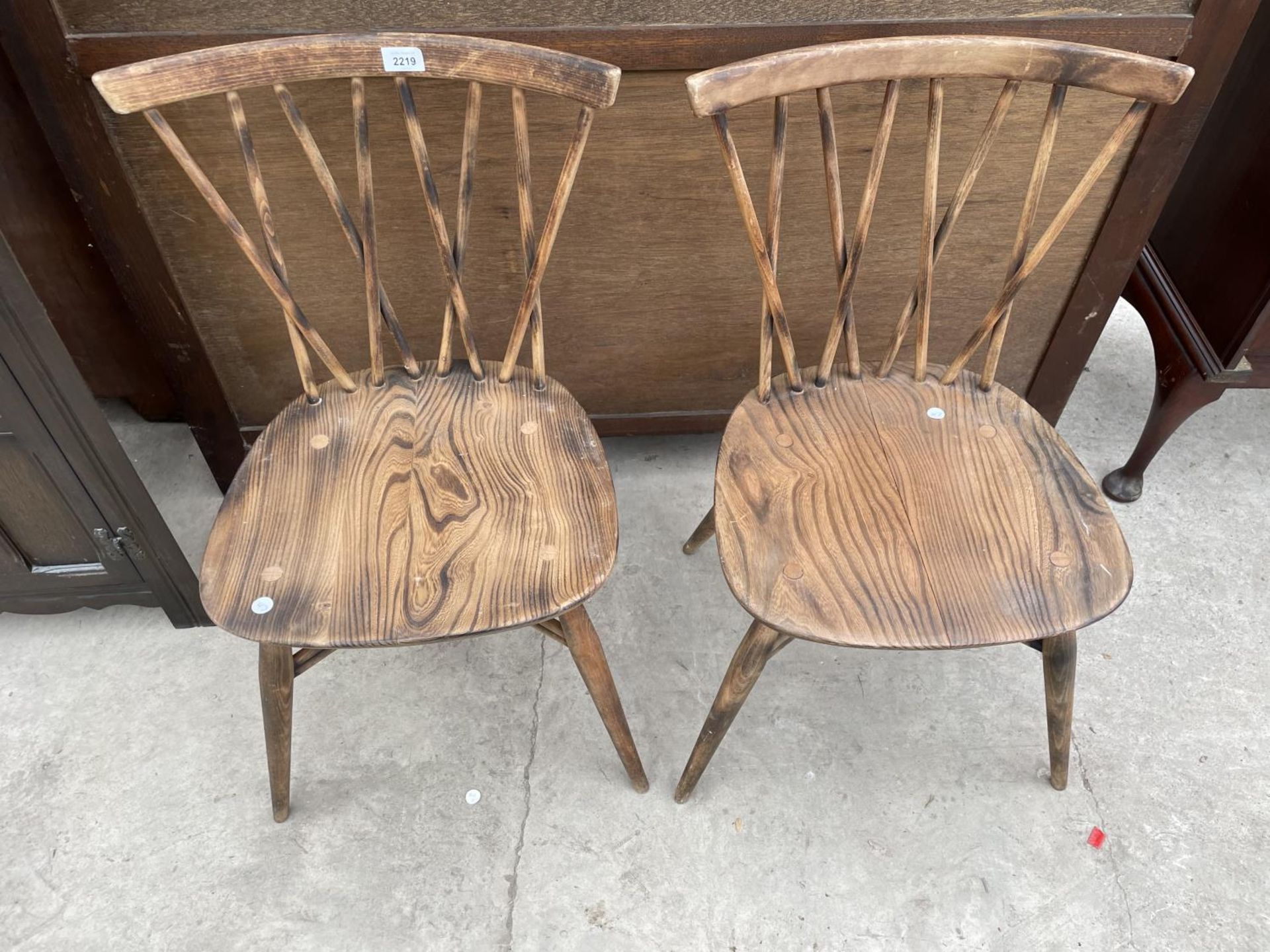 A PAIR OF ERCOL LATTICE BACK DINING CHAIRS