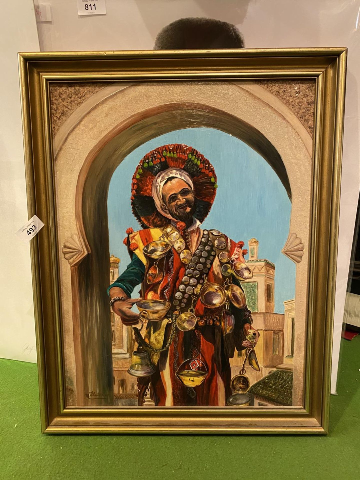 A GILT FRAMED ORIGINAL BY MARGARET FLETCHER OF A TANGIER SYRUP SELLER