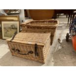 A WICKER LOG BASKET AND A WICKER PICNIC HAMPER