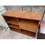 A RETRO TEAK OPEN BOOKCASE WITH TWO DRAWERS BEARING 'CLUB 8, MADE IN DENMARK' LABEL, 46" WIDE