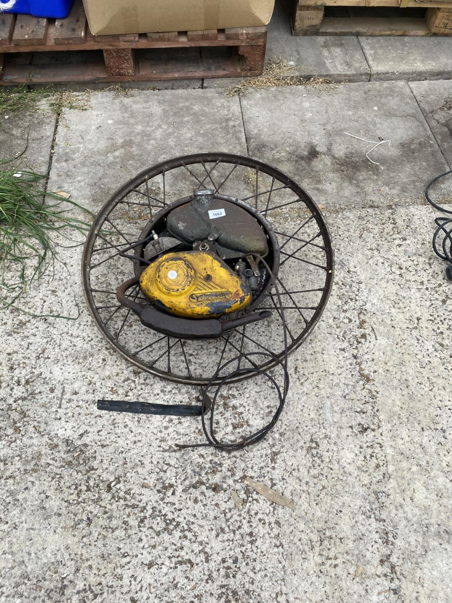 A VINTAGE CYCLEMASTER WHEEL WITH ENGINE