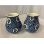 A PAIR OF HARRODS BLUE AND WHITE VASES