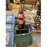 A SUFFOLK PUNCH 35 DL LAWN MOWER WITH GRASS BOX BELIEVED IN WORKING ORDER BUT NO WARRANTY