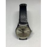 A VINTAGE RUSSIAN WRIST WATCH WITH LEATHER STRAP IN WORKING ORDER