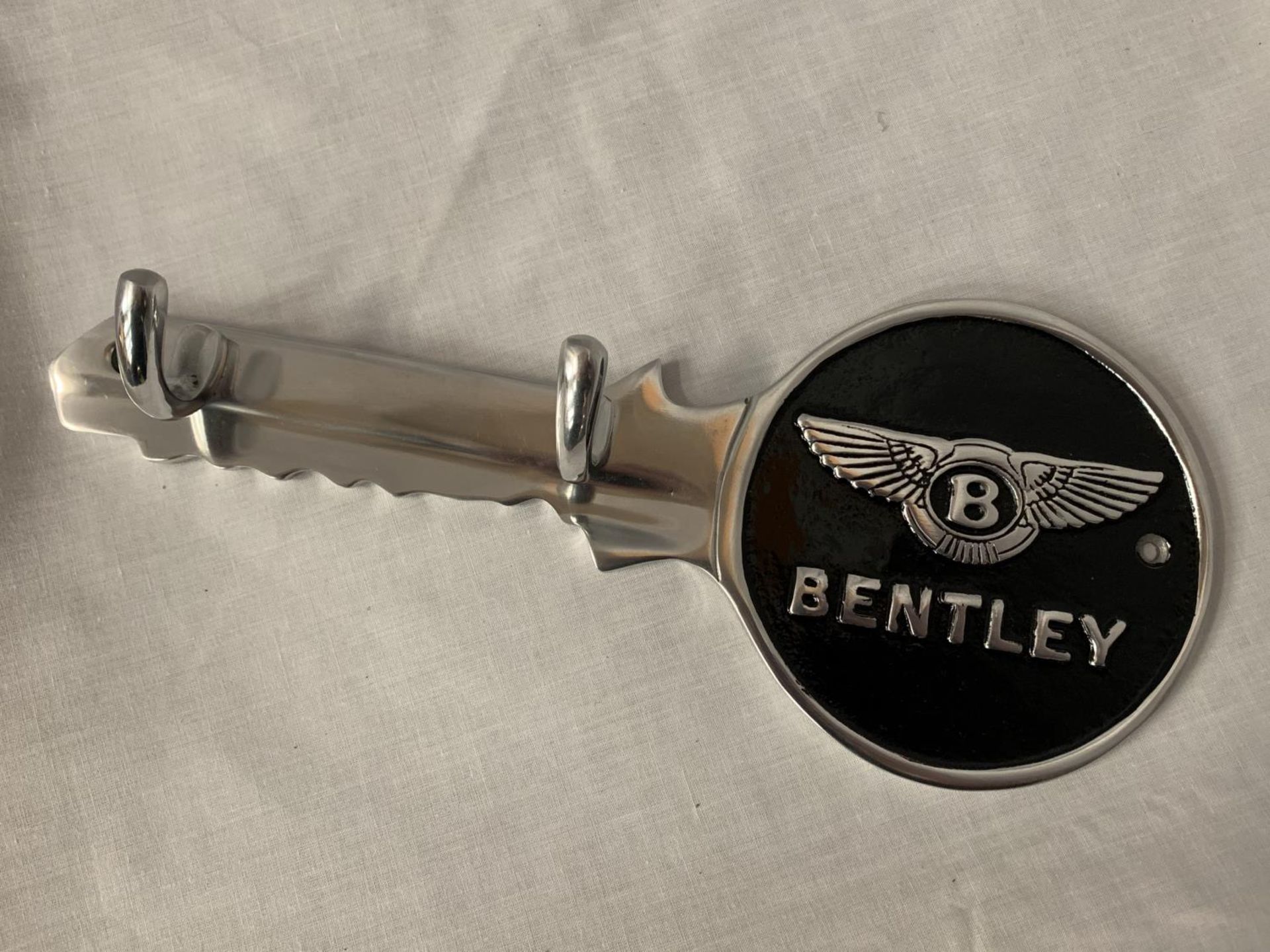 A CHROME 'BENTLEY' TWO HOOK KEY HOLDER L:30CM