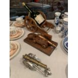 TWO VINTAGE CANNONS AND A BOTTLE HOLDER