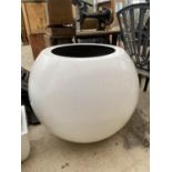 A LARGE DECORATIVE SPHERICAL FIBRE GLASS PLANTER (H:70CM PLANTING DIAMETER:42CM)