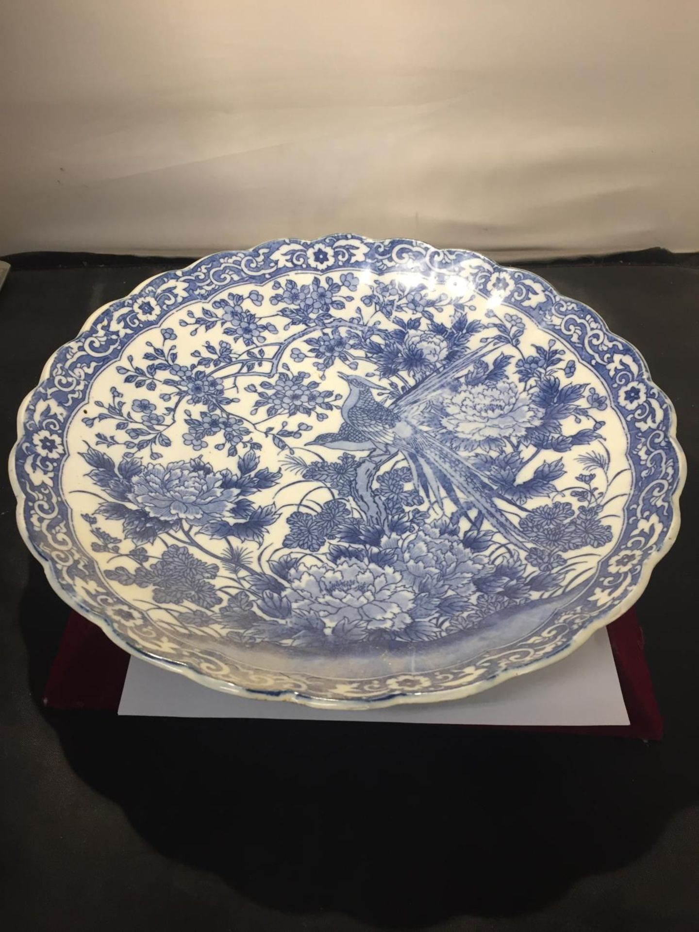 A LARGE JAPANESE BLUE AND WHITE CHARGER DIAMETER 12 INCHES