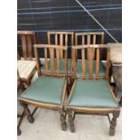 A SET OF FOUR EARLY 20TH CENTURY DINING CHAIRS WITH TURNED FRONT LEGS