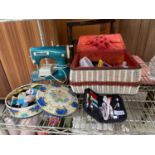 AN ASSORTMENT OF SEWING ITEMS TO INCLIUDE A STARLET SEWING MACHINE ETC