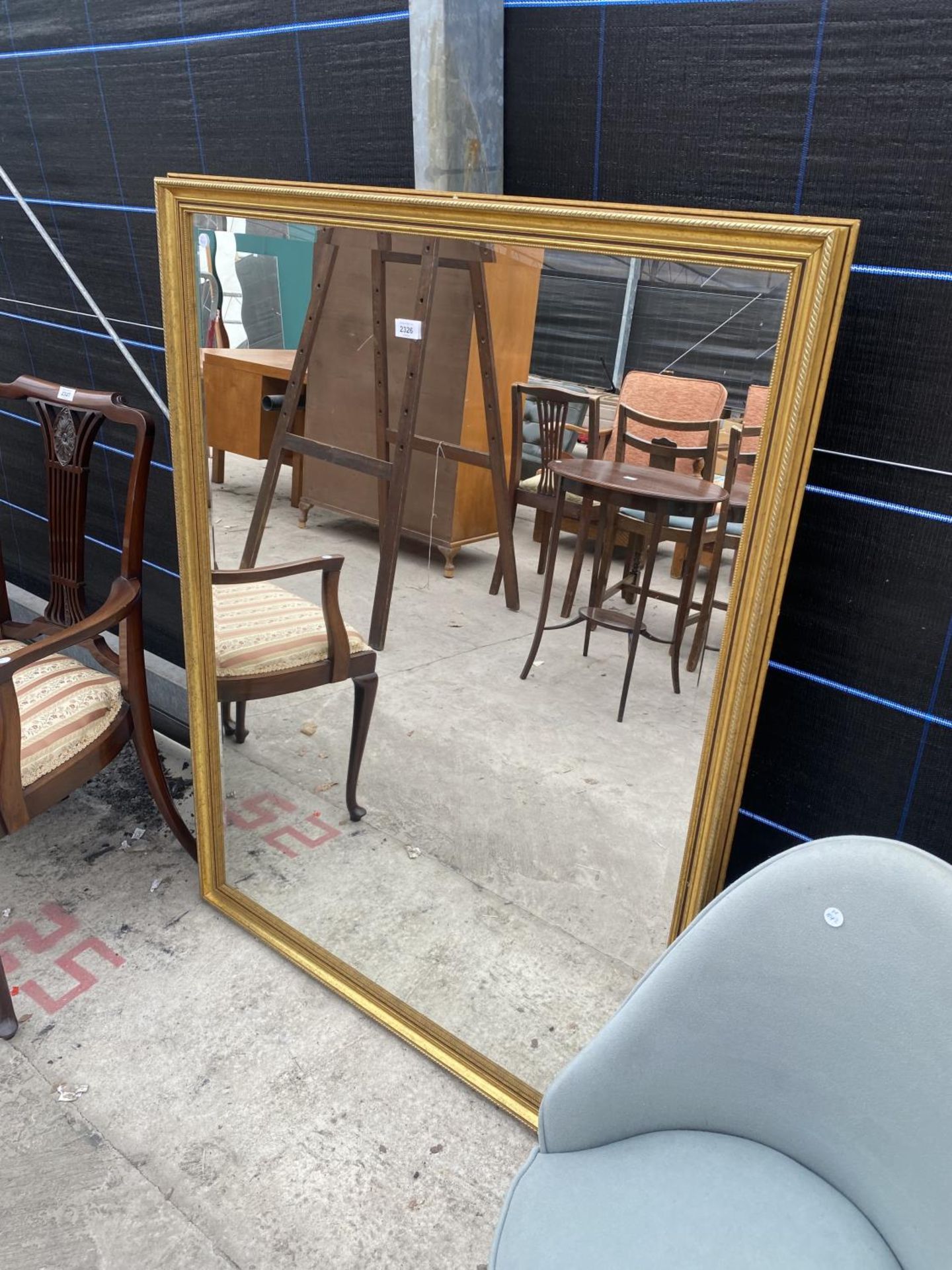 A MODERN GILT FRAMED BEVEL EDGE MIRROR, 40X52"