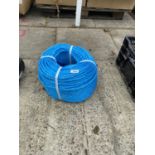 A ROLL OF BLUE ROPE