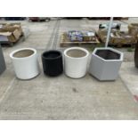 FOUR LARGE GARDEN PLANTERS