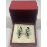 TWO SILVER SWAROVSKI CRYSTAL RINGS IN A PRESENTATION BOX