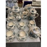 A LARGE MASON WARE COLLECTION - FRUIT BASKET TEA AND COFFEE POTS AND FIVE TRIOS PLUS PLATES AND