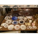 A LARGE COLLECTION TO INCLUDE COALPORT AND ROYAL DOULTON PLATES, COMMEMORATIVE WARE, ORNAMENTS ETC.