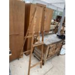 A WOODEN ARTISTS EASEL