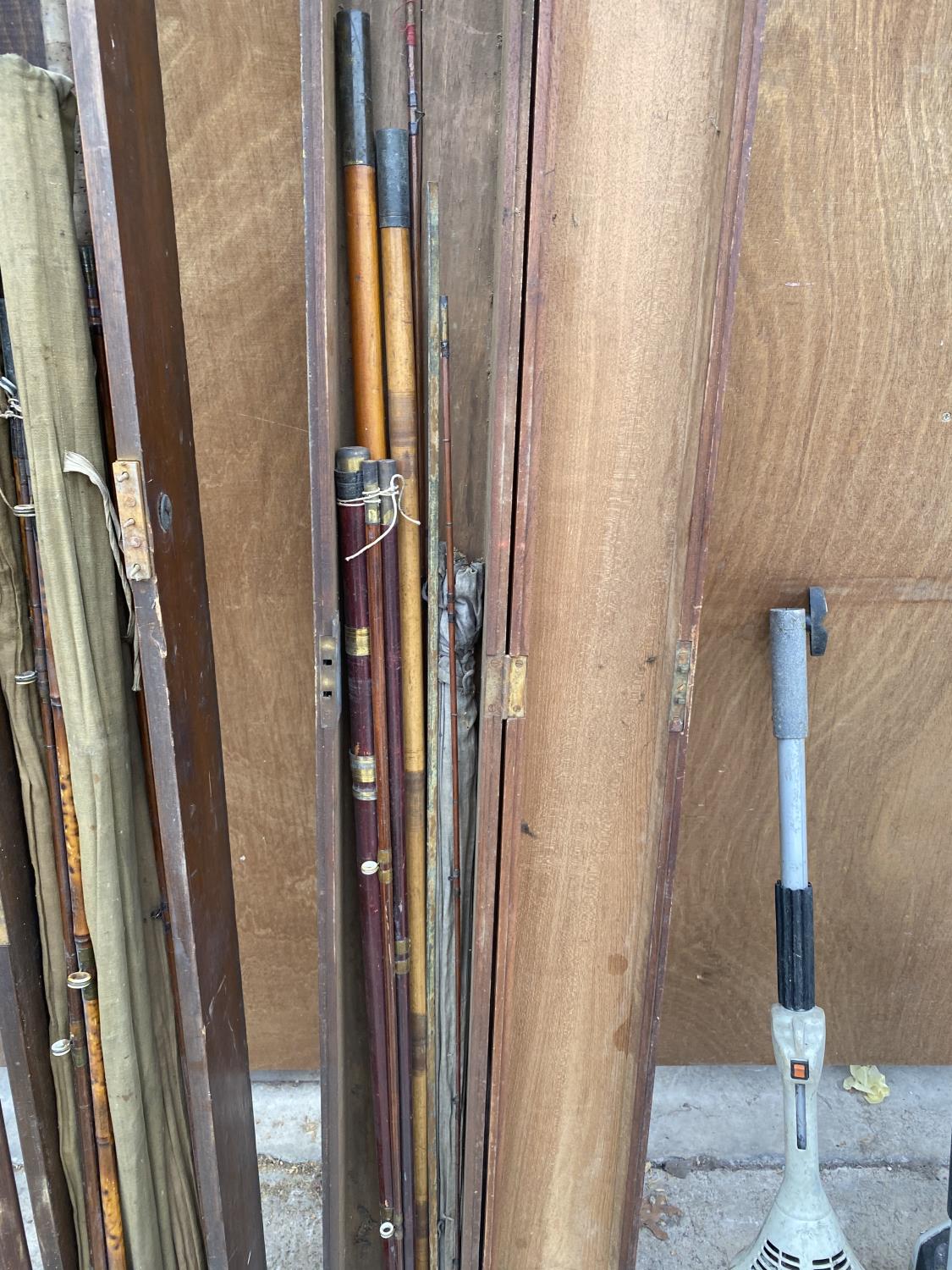 TWO VINTAGE WOODEN STORAGE CASES WITH AN ASSORTMENT OF FISHING RODS TO INCLUDE SPLIT CANES ETC - Image 2 of 4