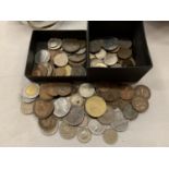 A SMALL BOX CONTAINING AN ASSORTMENT OF COINS OF VARIOUS DENOMINATIONS AND ORIGINS