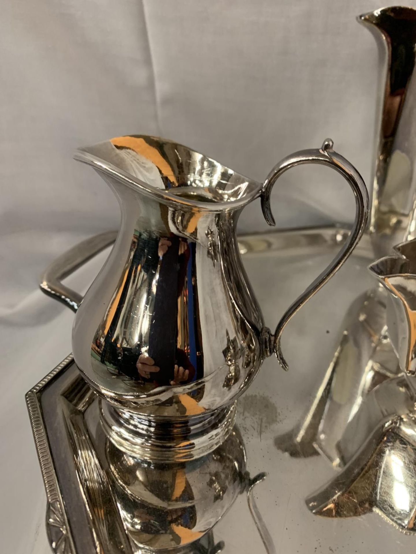 A LARGE SILVERPLATE TRAY WITH TWO SILVERPLATE TEA POTS, MILK AND CREAMER JUGS AND SUGAR BOWL - Image 6 of 6