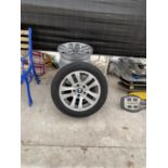A SET OF FOUR BMW RIMS TWO WITH TYRES