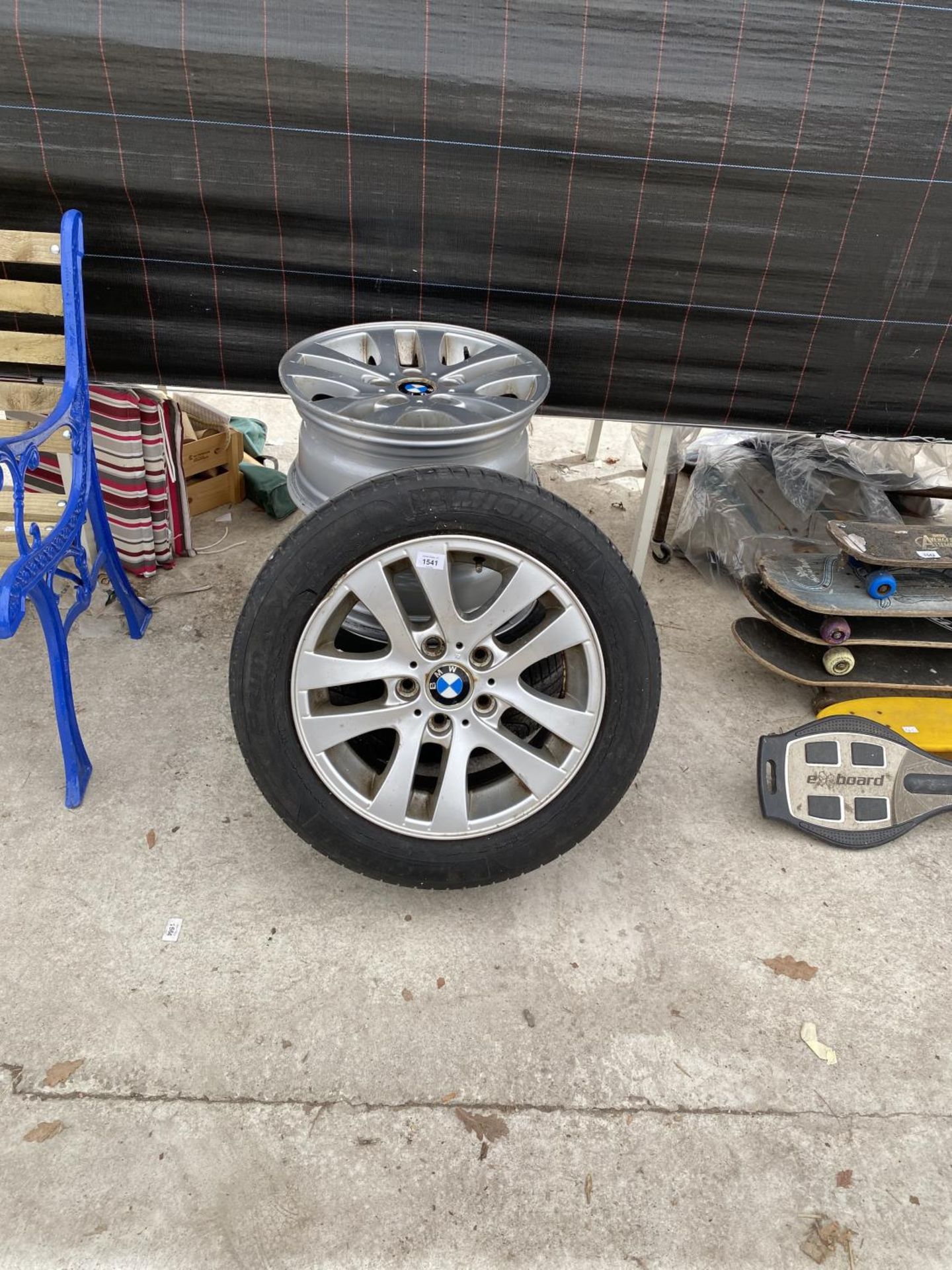 A SET OF FOUR BMW RIMS TWO WITH TYRES