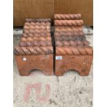 A GROUP OF 18 SECTIONS OF TERRACOTTA RIBBON TOPPED EDGING