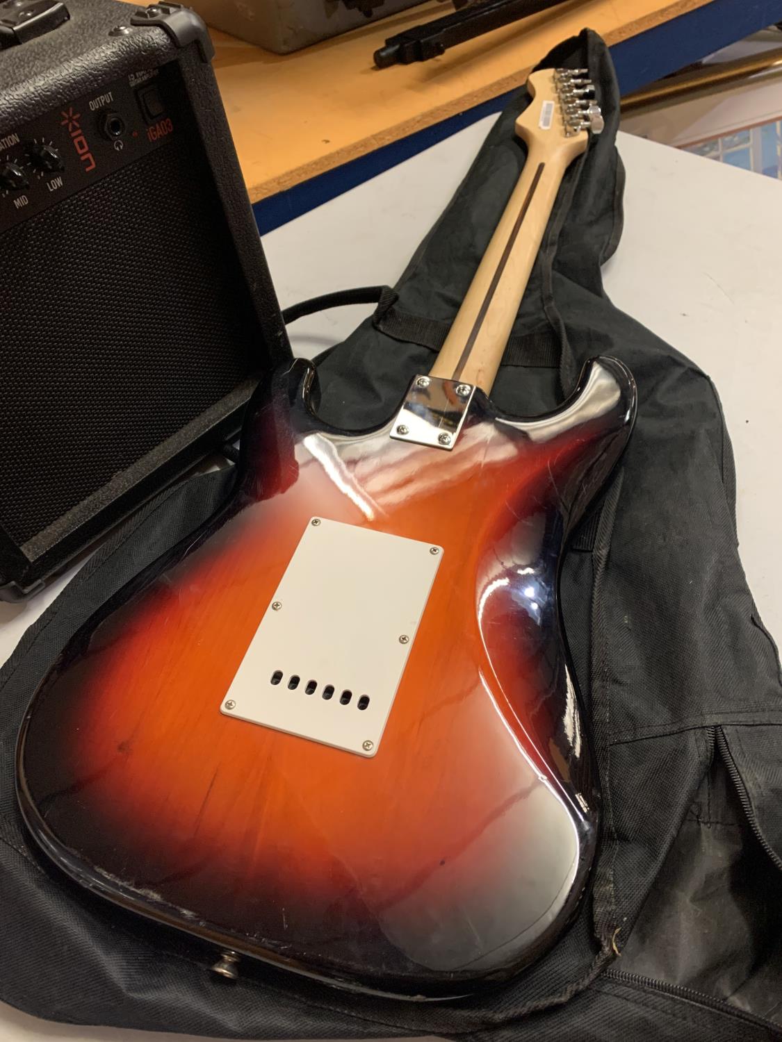 AN ION ELECTRIC GUITAR WITH CARRYING CASE AND AMPLIFIER - Image 3 of 5