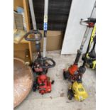 A PETROL HOMELITE STRIMMER AND A FURTHER PETROL STRIMMER