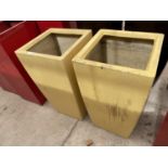 A PAIR OF YELLOW SQUARE FIBRE GLASS PLANTERS (H:80CM)