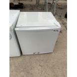 A WHITE CURRYS ESSENTIAL COUNTER TOP FRIDGE BELIEVED WORKING BUT NO WARRANTY