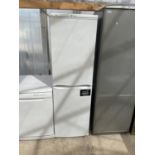 A WHITE HOTPOINT UPRIGHT FRIDGE FREEZER BELIEVED WORKING BUT NO WARRANTY