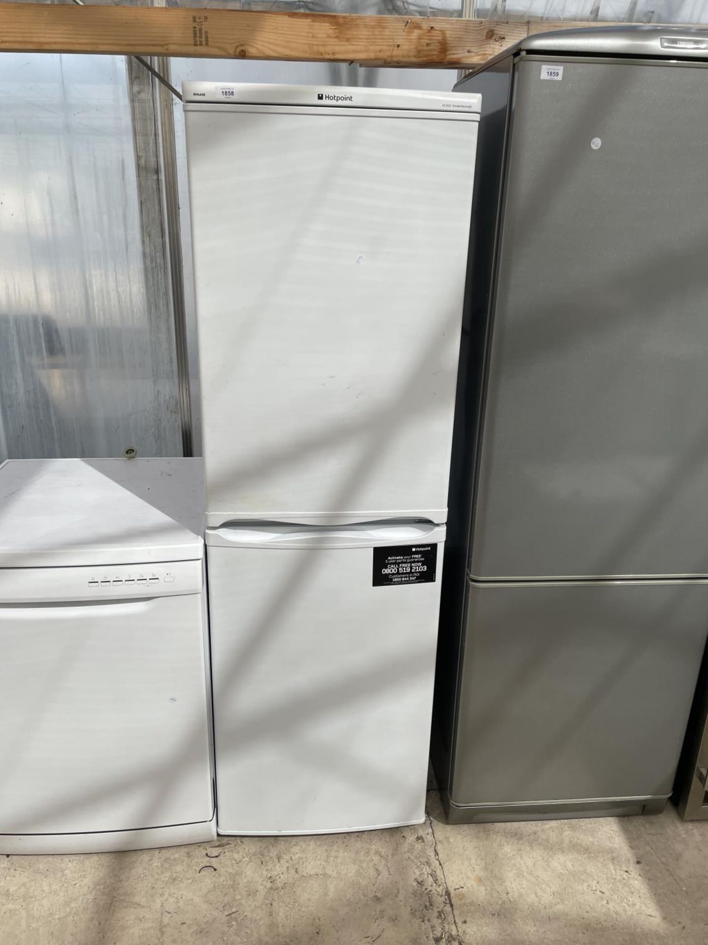 A WHITE HOTPOINT UPRIGHT FRIDGE FREEZER BELIEVED WORKING BUT NO WARRANTY