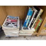 AN ASSORTMENT OF BOOKS AND PRIVATE EYE NEWSPAPERS