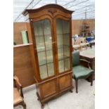 A GEORGIAN STYLE MAHOGANY DISPLAY CABINET ON CABRIOLE LEGS AND CUPBOARDS TO THE BASE, 37" WIDE