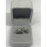 TWO MARKED 925 SILVER RINGS WITH CLEAR STONES ONE WITH A SOLITAIRE SIZE N IN A PRESENTATION BOX