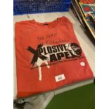 AN EXPOSIVE APE T-SHIRT AUTOGRAPHED BY 'EDDIE HALL - THE BEAST' THE WORLDS STRONGEST MAN