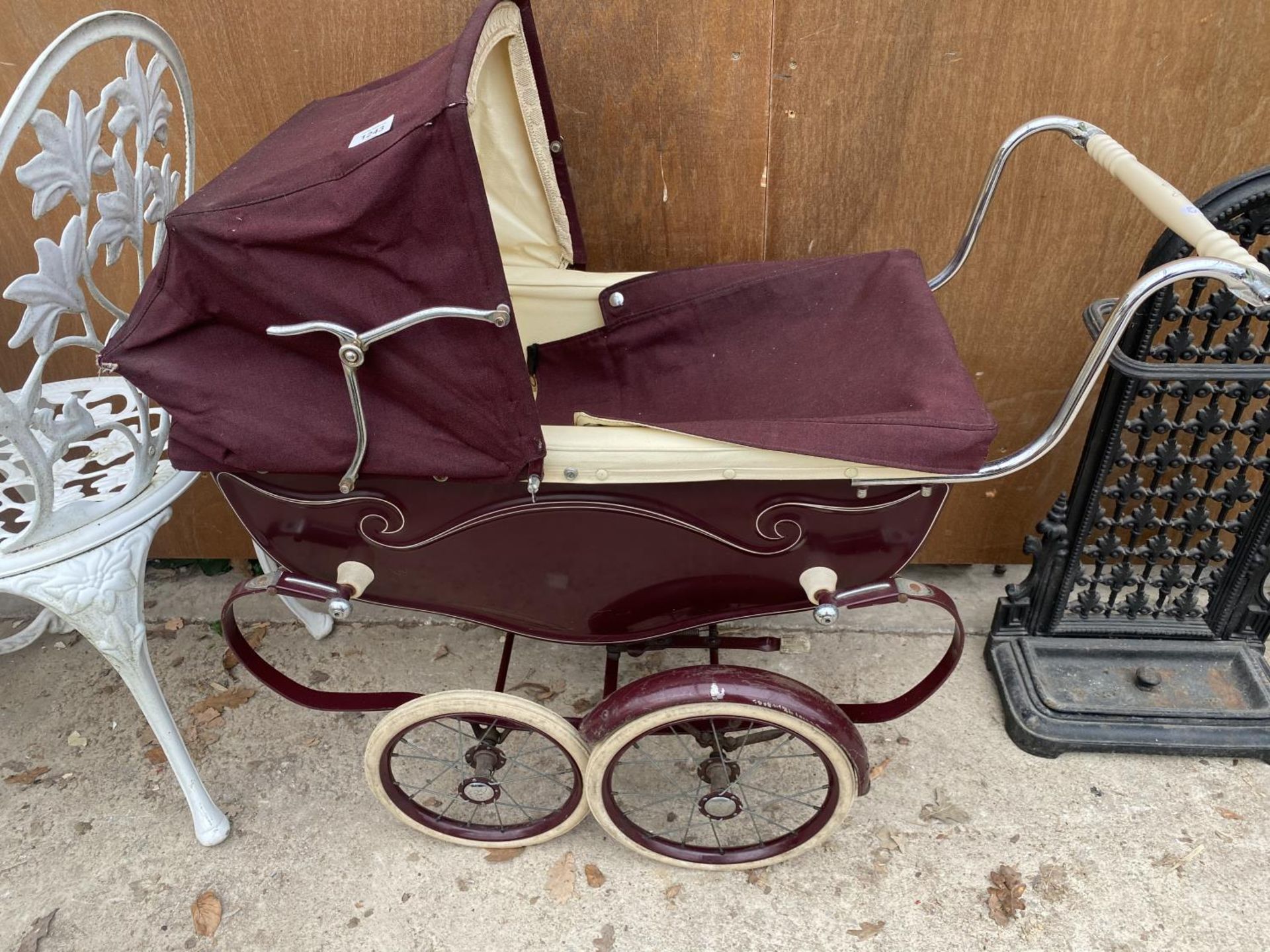 A VINTAGE SILVER CROSS PRAM