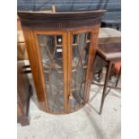 AN EDWARDIAN MAHOGANY AND INLAID CORNER CUPBOARD WITH ASTRAGAL GLAZED DOORS AND DENTIL CORNICE,