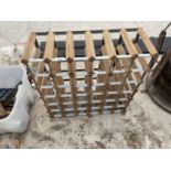 A WOODEN AND METAL BANDED WINE RACK