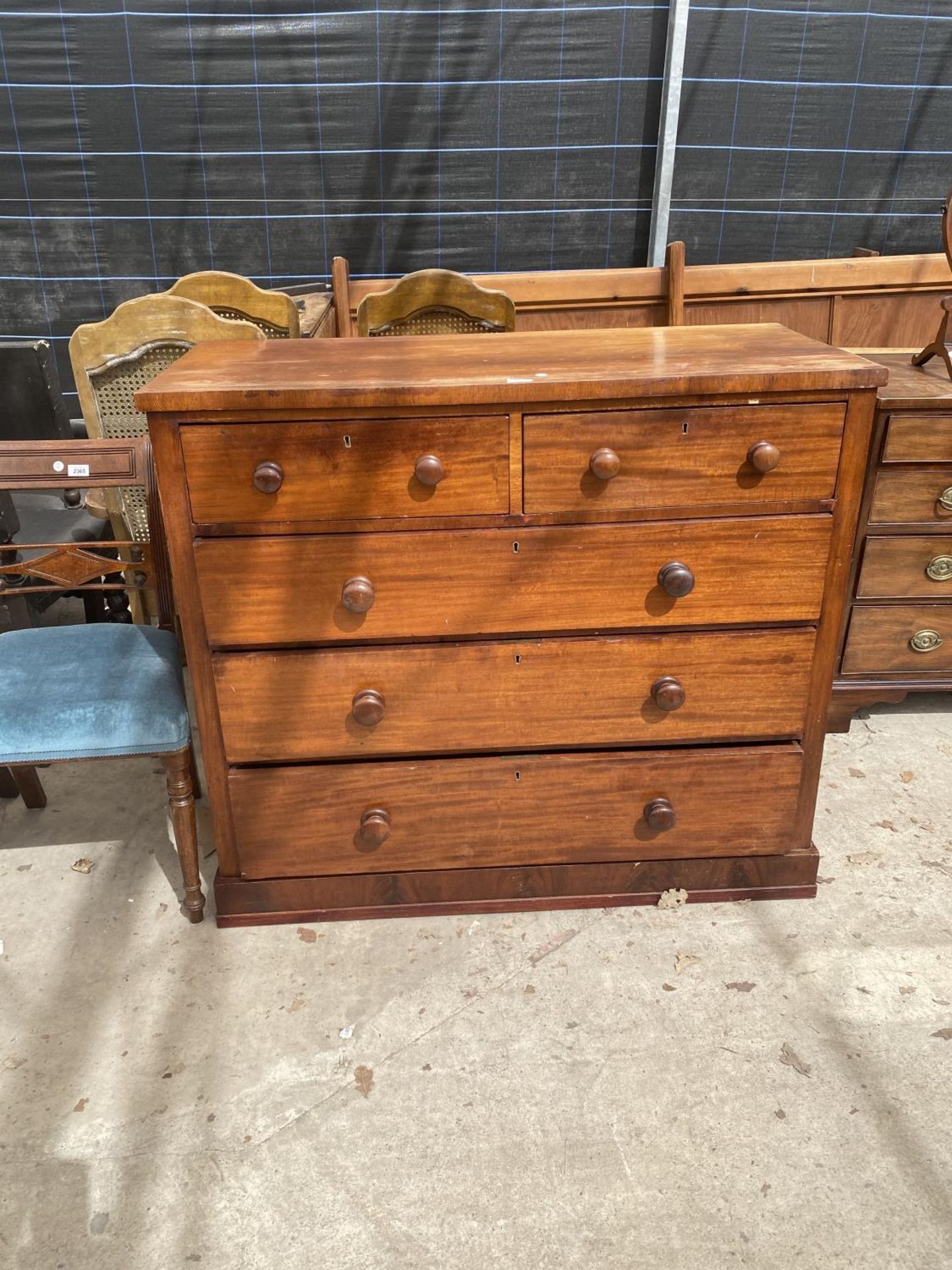 A VICTORIAN MAHOGANY CHEST OF TWO SHORT AND THREE LONG DRAWERS W:44"