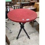 A GYPSIES TABLE ON TURNED EBONISED LEGS, 21" DIAMETER